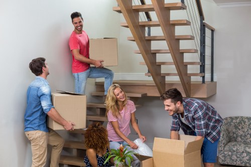 Moving van and packed boxes for home moves in Harlington
