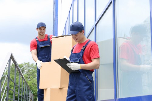 Local removals van loading household items in Harlington