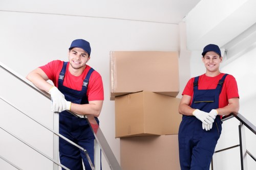 Moving team using safety equipment during a Harlington van service