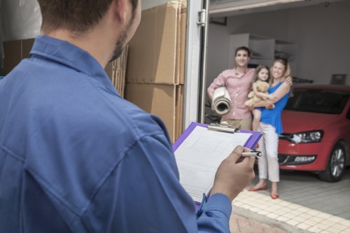 Local moving van navigating Harlington residential streets