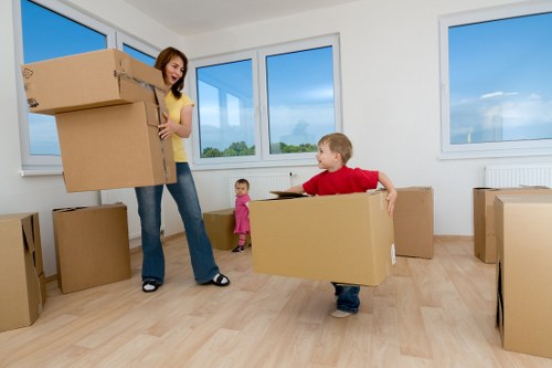 Local van loading furniture near Harlington homes
